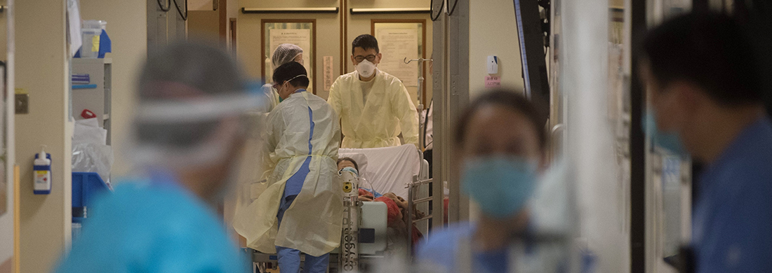 Clinical team providing medical service to patients under COVID-19